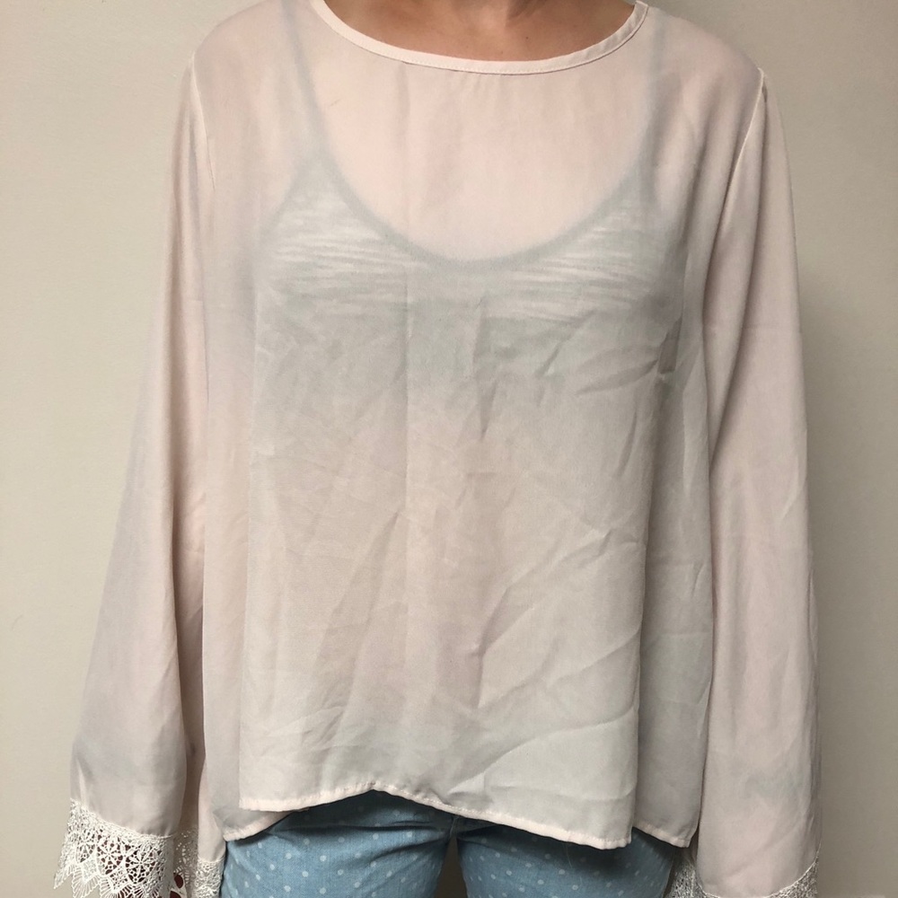 Sheer lace bell sleeve top